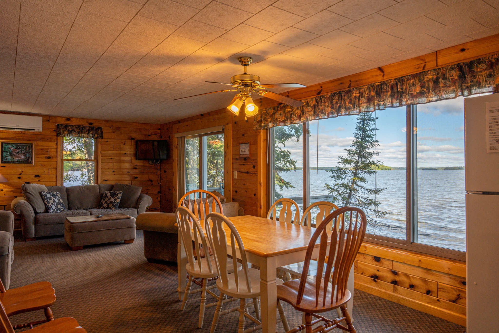 Minnesota cabin interior with large windows viewing over Pelican Lake at Cabin O' Pines Resort & Campground